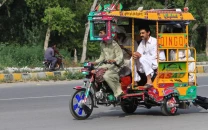 punjab bans petrol powered qingqis motorcycles to curb smog