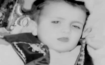 excavation uncovers child lost in 2005 quake
