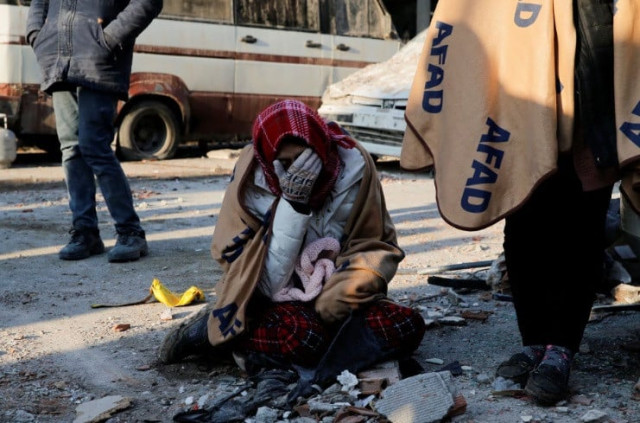 freezing weather hampers relief as quake toll tops 12 000 freezing weather hampers relief as quake toll tops 12 000
