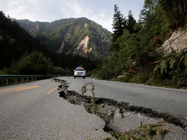 a file photo of a crack running through a mountain road after an earthquake photo reuters a file photo of a crack running through a mountain road after an earthquake photo reuters