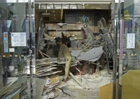 a worker cleans up inside a commercial facility in hachinohe in aomori prefecture northeastern japan december 9 2025 following a strong earthquake the previous night photo reuters