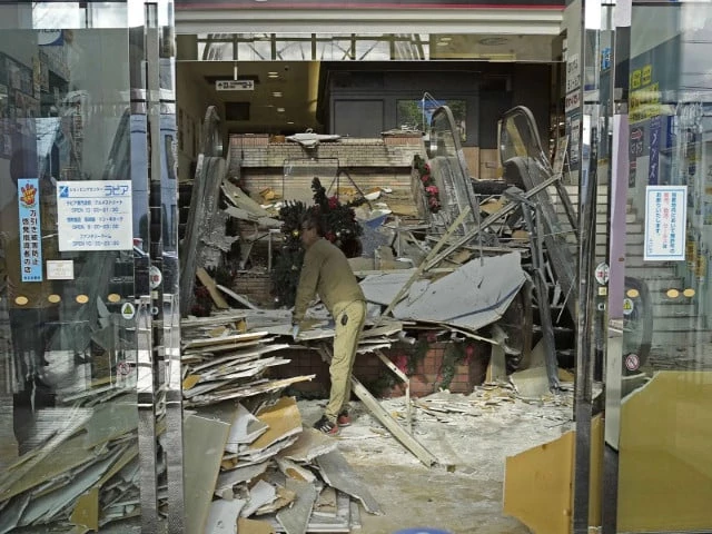 a worker cleans up inside a commercial facility in hachinohe in aomori prefecture northeastern japan december 9 2025 following a strong earthquake the previous night photo reuters a worker cleans up inside a commercial facility in hachinohe in aomori prefecture northeastern japan december 9 2025 following a strong earthquake the previous night photo reuters