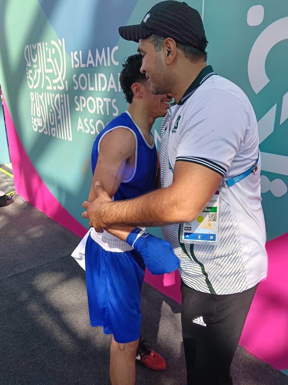 Boxer Qudratullah and coach Nisar Khan after the quarterfinal bout at Islamic Solidarity Games 2025 in Riyadh. PHOTO COURTRESY: PBF