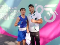 qudratullah confirmed second islamic solidarity games 2025 bronze medal for pakistan he poses with his coach nisar khan after the quarterfinal bout photo courtesy pbf qudratullah confirmed second islamic solidarity games 2025 bronze medal for pakistan he poses with his coach nisar khan after the quarterfinal bout photo courtesy pbf