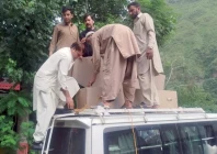 poverty s cruel homecoming people unload the coffin of a coal miner after the body arrived in k p s shangla photo express