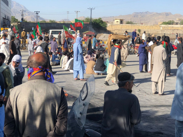 photo shows protestors gathered at the main airport road in quetta on tuesday may 9 2023 photo shows protestors gathered at the main airport road in quetta on tuesday may 9 2023