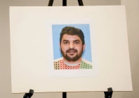 a picture of rahmanullah lakanwal an afghan national who is the suspect in the shooting of two national guard members is displayed at a press conference with fbi director kash patel attorney jeanine pirro and other authorities in washington d c u s november 27 2025 photo reuters