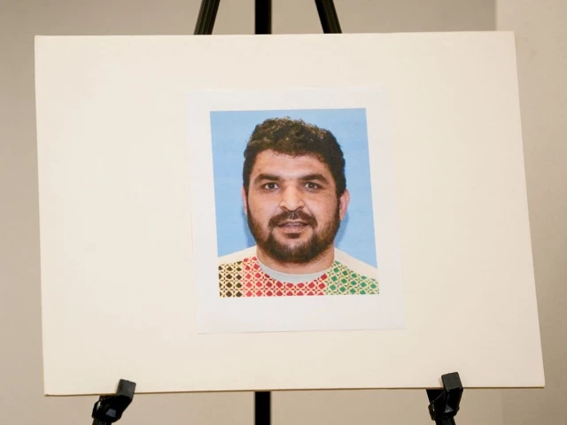a picture of rahmanullah lakanwal an afghan national who is the suspect in the shooting of two national guard members is displayed at a press conference with fbi director kash patel attorney jeanine pirro and other authorities in washington d c u s november 27 2025 photo reuters