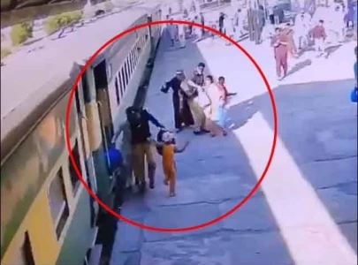 watch hero cops save woman and children from moving train
