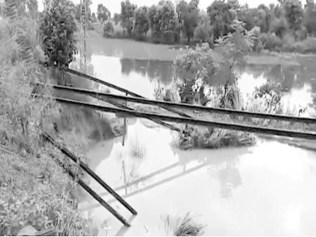 the shakargarh railway track lies twisted and broken in narowal as floodwaters rip through punjab submerging vast stretches of the province in the worst inundation in years photo nni the shakargarh railway track lies twisted and broken in narowal as floodwaters rip through punjab submerging vast stretches of the province in the worst inundation in years photo nni