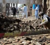 a man clears the rubble of his damaged house collapsed after heavy rains in bannu photo reuters
