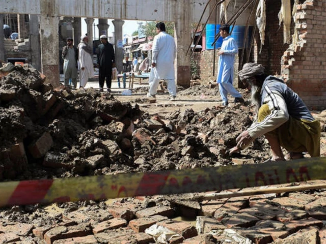 a man clears the rubble of his damaged house collapsed after heavy rains in bannu photo reuters a man clears the rubble of his damaged house collapsed after heavy rains in bannu photo reuters
