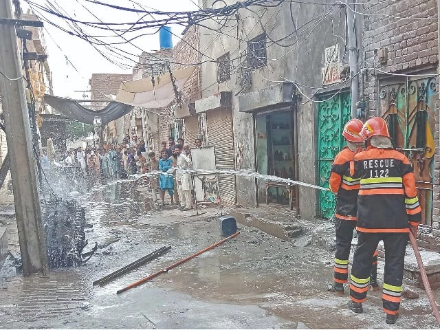 rescue workers extinguish a fire that broke out in a power transformer in shah rukn e alam colony in multan four workers repairing the transformer were injured when it exploded photo ppi rescue workers extinguish a fire that broke out in a power transformer in shah rukn e alam colony in multan four workers repairing the transformer were injured when it exploded photo ppi