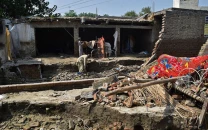 four killed nine injured in rains across k p