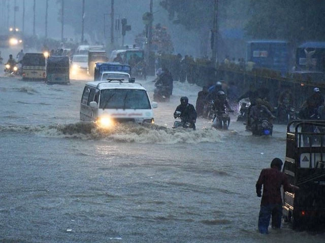 commuters struggle to move forward in a flooded street after heavy monsoon rains in karachi on august 27 2020 photo anadolu agency commuters struggle to move forward in a flooded street after heavy monsoon rains in karachi on august 27 2020 photo anadolu agency