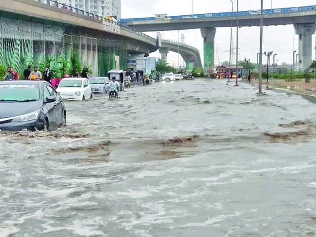 vehicles wade through a waterlogged road after heavy monsoon showers lash karachi photo jalal qureshi express vehicles wade through a waterlogged road after heavy monsoon showers lash karachi photo jalal qureshi express