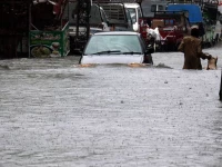 a view of vehicle passing through flooded road during heavy monsoon rains in rawalpindi on july 17 photo inp a view of vehicle passing through flooded road during heavy monsoon rains in rawalpindi on july 17 photo inp