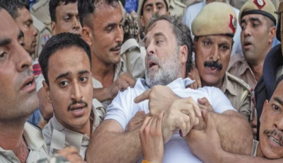 carried away indian opposition leader rahul gandhi is detained by police during a sit in protest outside prime minister narendra modi s residence in new delhi photo reuters