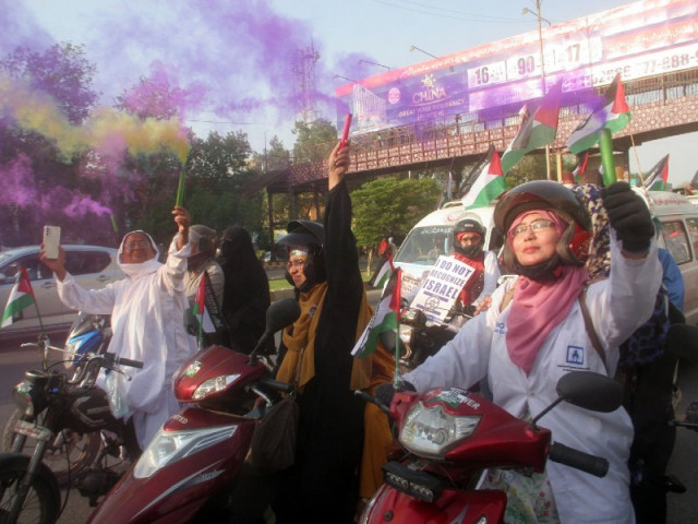 an ambulance rally passing through shahrah e faisal to express solidarity with palestine under palestine foundation pakistan in karachi on may 12 2024 photo online an ambulance rally passing through shahrah e faisal to express solidarity with palestine under palestine foundation pakistan in karachi on may 12 2024 photo online