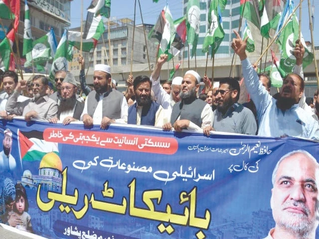 jamaat e islami activists and traders protest against the israeli atrocities on civilians in gaza in peshawar photo express jamaat e islami activists and traders protest against the israeli atrocities on civilians in gaza in peshawar photo express
