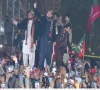 k p chief minister sohail afridi waves to the supporters during a rally in hyderabad photo inp