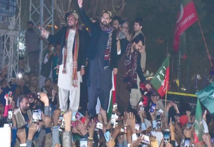 k p chief minister sohail afridi waves to the supporters during a rally in hyderabad photo inp