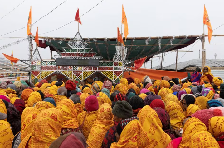 hindu devotees wait to collect free blankets at the tent city built for the pilgrims on the banks of the sarayu river ahead of the opening of the temple of lord ram in ayodhya india january 20 2024 photo reuters