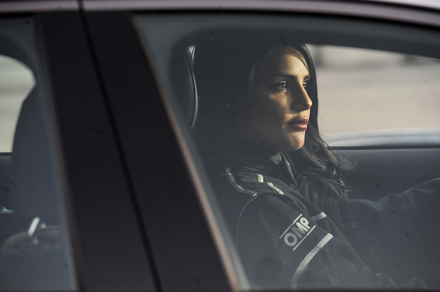 Rana Almimoni sits in her car on a track in Dirab motor park. PHOTO: AFP 