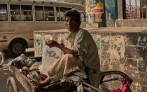 karachi woman dresses as man to support family