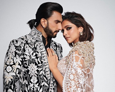 in pictures deepika padukone ranveer singh look regal for runway debut