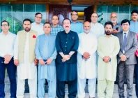 azad jammu and kashmir prime minister faisal mumtaz rathore poses for a group photo with a delegation of the all kashmir newspaper society in ajk photo express