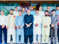 azad jammu and kashmir prime minister faisal mumtaz rathore poses for a group photo with a delegation of the all kashmir newspaper society in ajk photo express