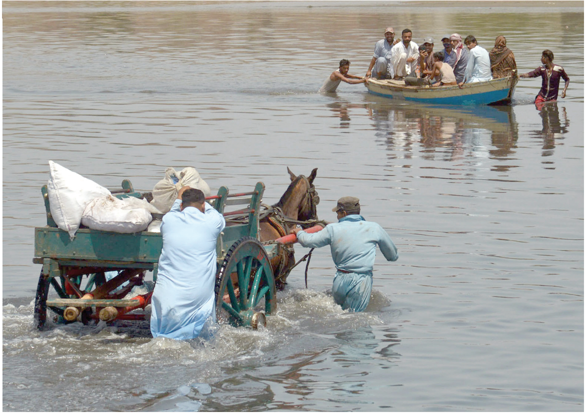 alternate routes due to blockades citizens have to cross the ravi river in order to reach their destinations photo online