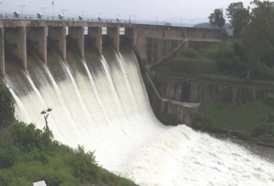 water gushes down from the spillways of rawal dam the district administration opened the spillways of the dam after continuous rains raised the reservoir s level to 1 748 feet photo inp