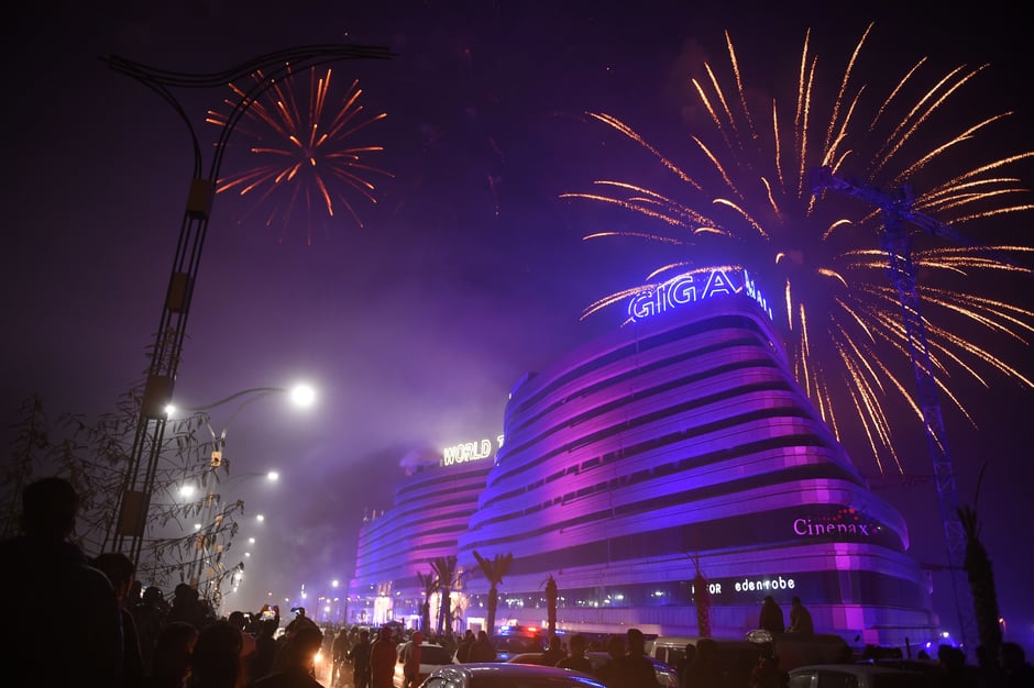 People watch the fireworks display during the New Year celebrations in Rawalpindi. PHOTO: AFP