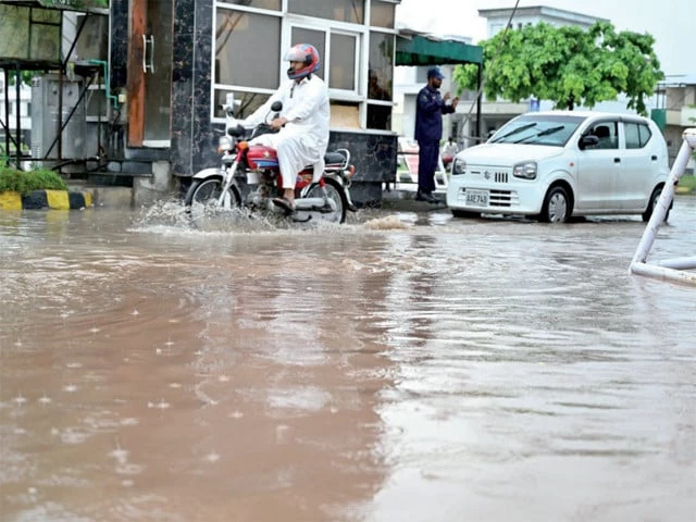 swamped again motorists ride through floodwaters at the entrance of media town in rawalpindi following monday s heavy downpour that flooded parts of the garrison city photo app swamped again motorists ride through floodwaters at the entrance of media town in rawalpindi following monday s heavy downpour that flooded parts of the garrison city photo app