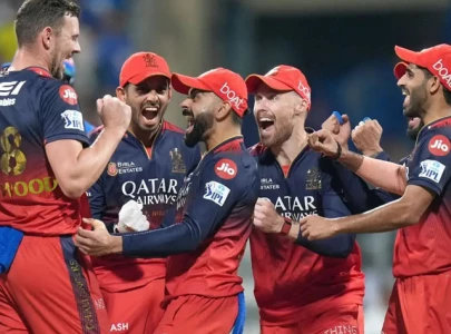 ipl virat kohli rajat patidar shine as rcb beat mi by 12 runs