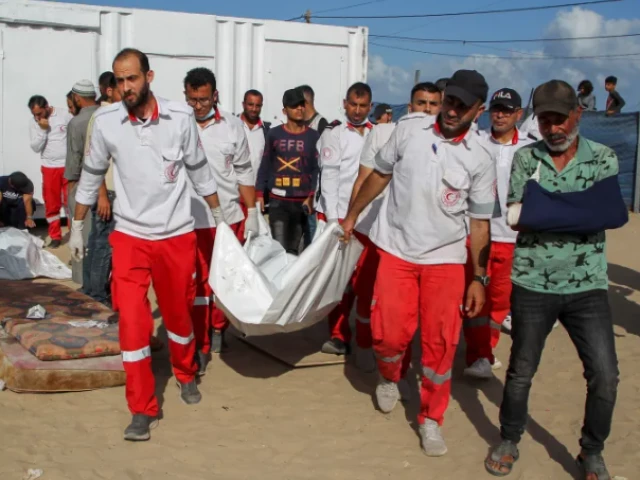 members of the palestine red crescent society carry the bodies of their fellow paramedics who were killed by israeli forces in rafah in the southern gaza strip photo reuters members of the palestine red crescent society carry the bodies of their fellow paramedics who were killed by israeli forces in rafah in the southern gaza strip photo reuters