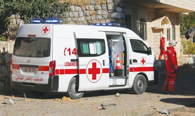 lebanese red cross members stand near a site hit by an israeli strike in marjayoun lebabon near the border with israel october 27 2024 photo reuters