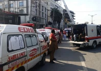 ambulances and rescue personnel at the site photo reporter