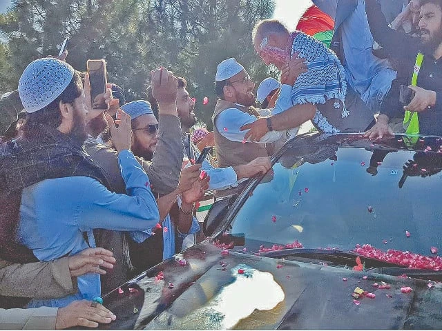 jamaat e islami central vice amir mian muhammad aslam welcomes former senator mushtaq ahmad on the latter s arrival at the islamabad international airport a large number of party workers were present as the former senator was received in a rally like procession photo nni jamaat e islami central vice amir mian muhammad aslam welcomes former senator mushtaq ahmad on the latter s arrival at the islamabad international airport a large number of party workers were present as the former senator was received in a rally like procession photo nni