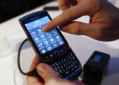 rim unveils new blackberry to counter apple iphone