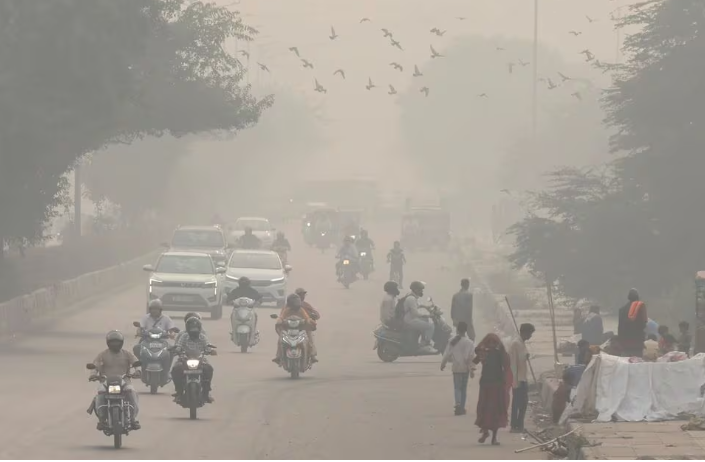 people and vehicles are seen on a road amidst the morningpeople and vehicles are seen on a road amidst the morning smog in new delhi india november 8 2023 reuters anushree fadnavis acquire licensing rights smog in new delhi india november 8 2023 reuters anushree fadnavis acquire licensing rights