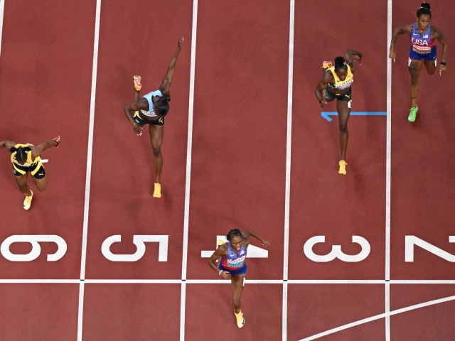 us melissa jefferson bottom c crosses the finish line to win as she competes in the women s 100m final next to jamaica s athlete tina clayton l saint lucia s athlete julien alfred jamaica s athlete shericka jackson and us athlete sha carri richardson during the world athletics championships in tokyo photo afp