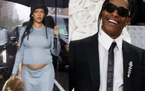 rihanna confirms third pregnancy debuts baby bump ahead of met gala 2025