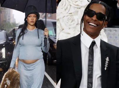 rihanna confirms third pregnancy debuts baby bump ahead of met gala 2025