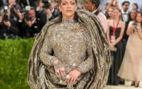 rihanna met gala photos spark debate as online and real life images look strikingly different