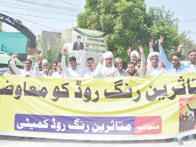 landowners affected by the rawalpindi ring road project stage a peaceful hour long protest outside the office of rawalpindi division commissioner demanding long overdue compensation for the 8 992 kanals of land acquired for the 38 3 kilometre infrastructure project photo express