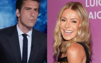kelly ripa jokes about taking indecent photos in front of david muir s abc portrait kelly ripa jokes about taking indecent photos in front of david muir s abc portrait