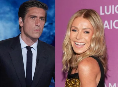 kelly ripa jokes about taking indecent photos in front of david muir s abc portrait